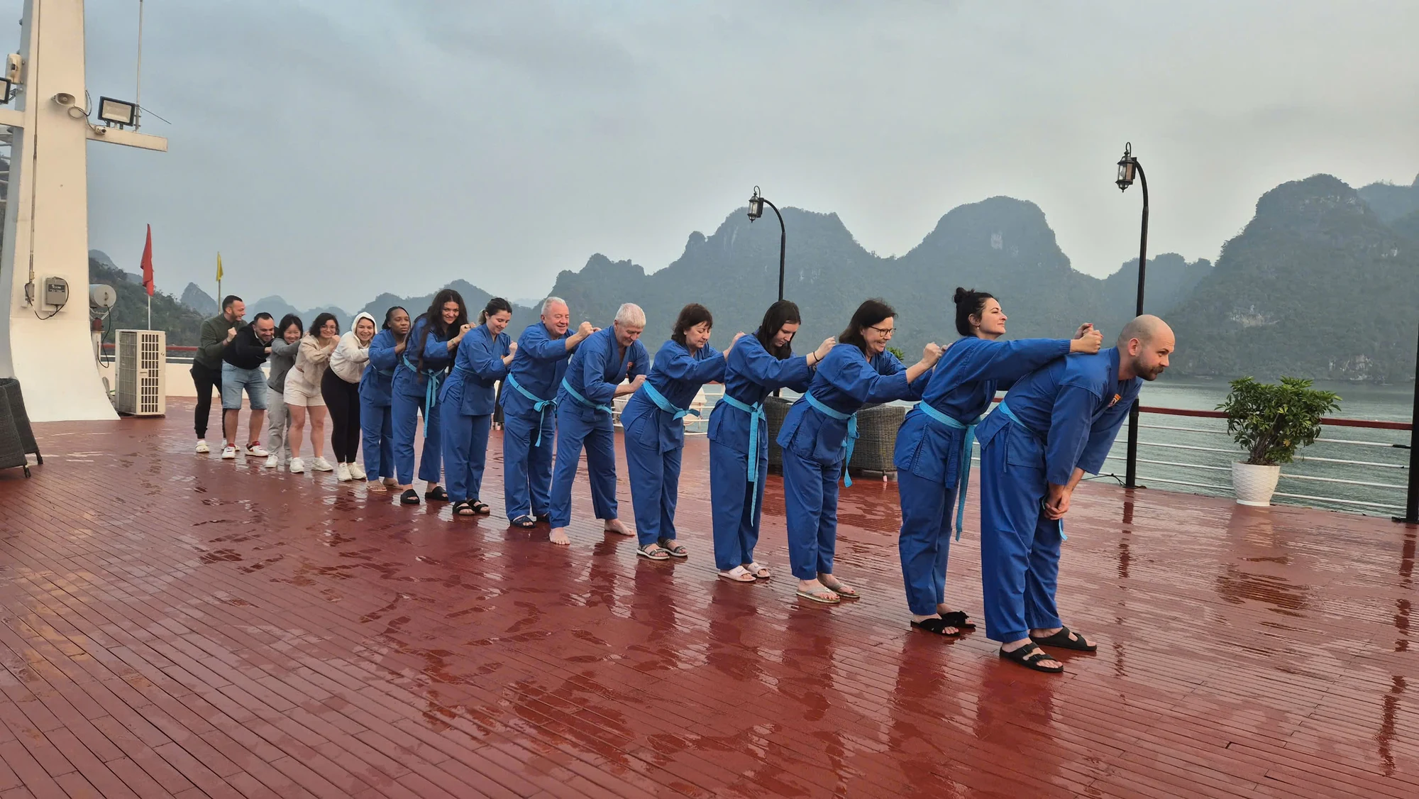 Morning Tai Chi with guests on the Aqua Of The Seas sundeck